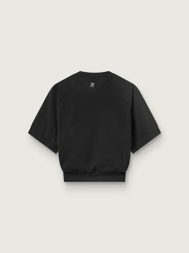 Chemise de sport court noire pour femme