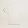 Chemise en coton blanc délavé pour femme avec inscription noire