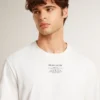 Chemise en coton blanc délavé pour homme avec lettrage noir