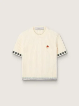 Chemise en maille blanche pour femme avec bords contrastés et broche amovible