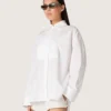 Chemise oversize pour femme en coton blanc avec plis et boutons décoratifs