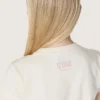 Chemise « Star » pour fille en jersey de coton blanc avec une étoile rose pailletée