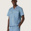 Chemise unisexe en denim bleu clair avec broderie dans le dos