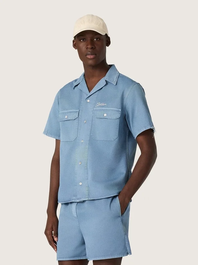 Chemise unisexe en denim bleu clair avec broderie dans le dos