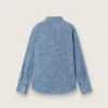 Chemise unisexe Journey en chambray de coton bleu clair avec ourlet frangé et écusson brodé