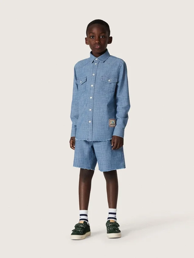 Short unisexe Journey en chambray de coton bleu clair avec logo brodé
