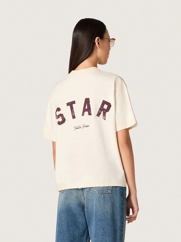 Chemise unisexe « Star » en coton blanc, ornée de cristaux dégradés sur toute la surface et d’un imprimé dans le dos