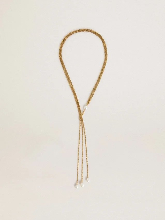 Collier avec des chaînes couleur or antique et des perles