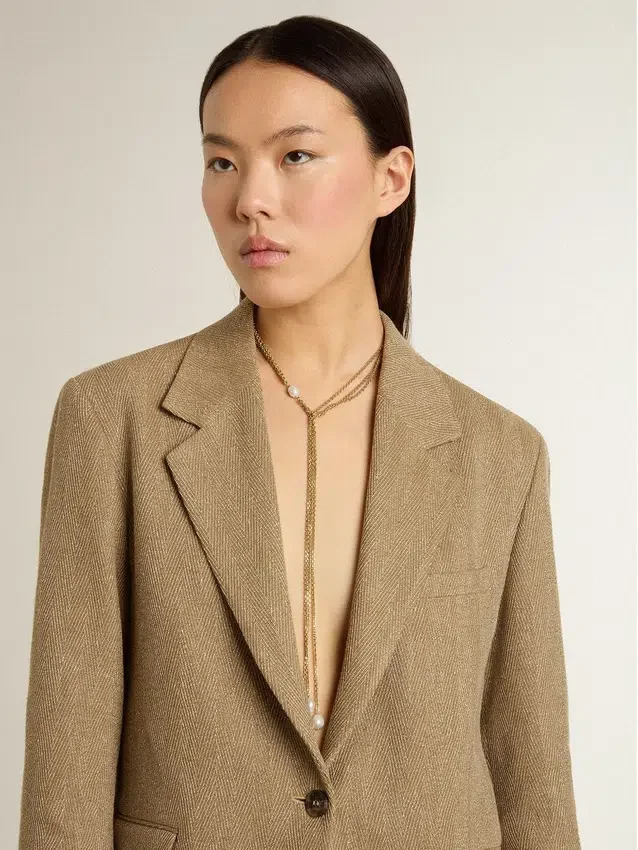 Collier avec des chaînes couleur or antique et des perles