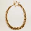 Collier à maillons décroissants en laiton couleur or antique avec fermoir en forme d’étoile