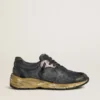 Dad-Star pour femme en cuir naplak noir et cuir craquelé, avec étoile et languette de talon noires
