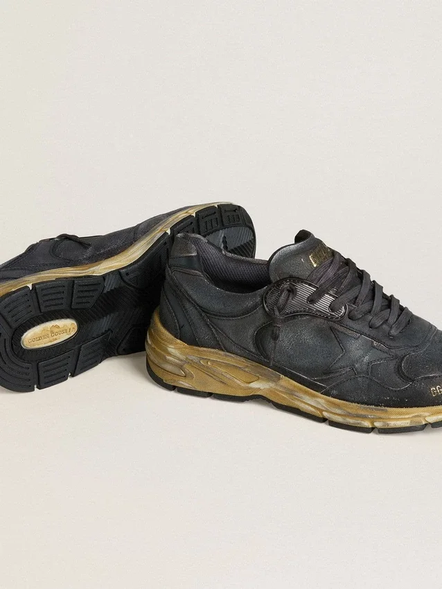 Dad-Star pour femme en cuir naplak noir et cuir craquelé, avec étoile et languette de talon noires