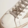 Fermeture à lacets avec clip en forme d’étoile couleur or antique