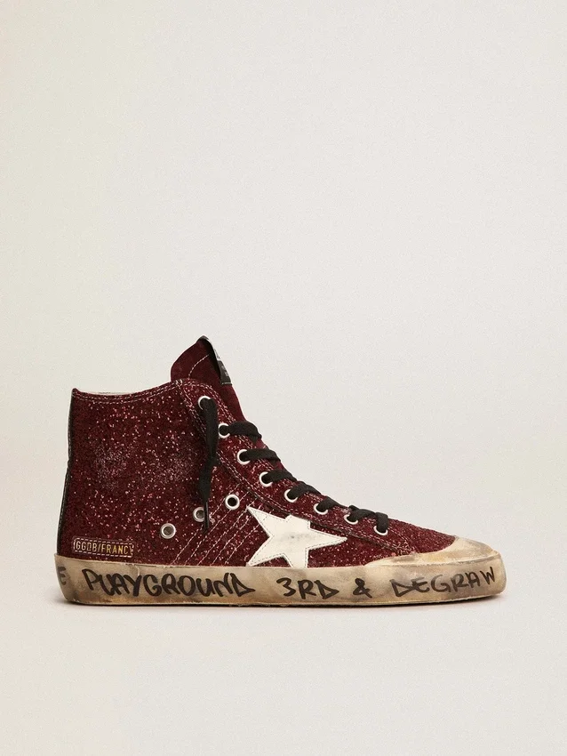 Francy Penstar en paillettes bordeaux avec une étoile en cuir blanc