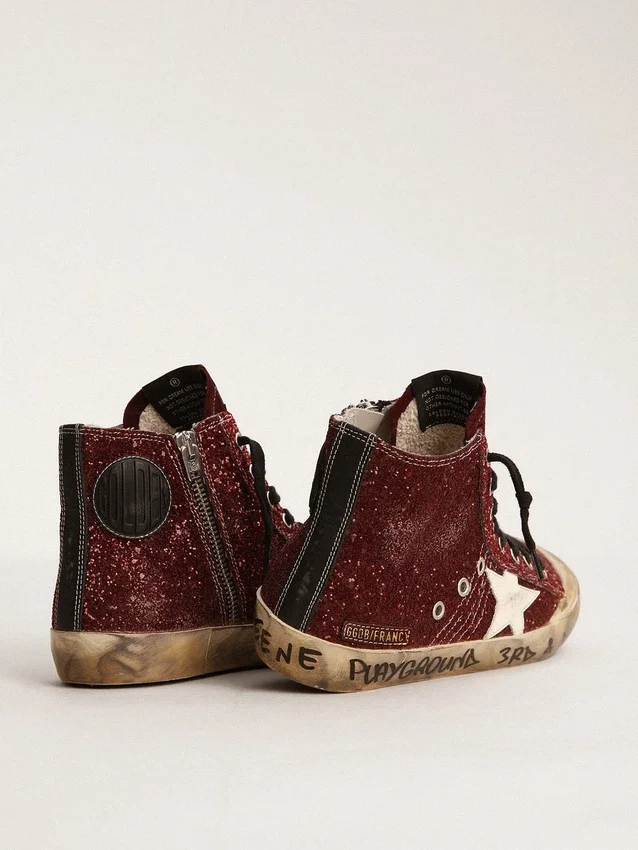 Francy Penstar en paillettes bordeaux avec une étoile en cuir blanc