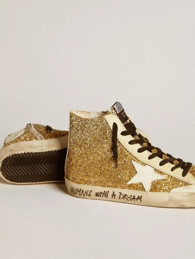 Francy Penstar en paillettes dorées avec une étoile en cuir blanc
