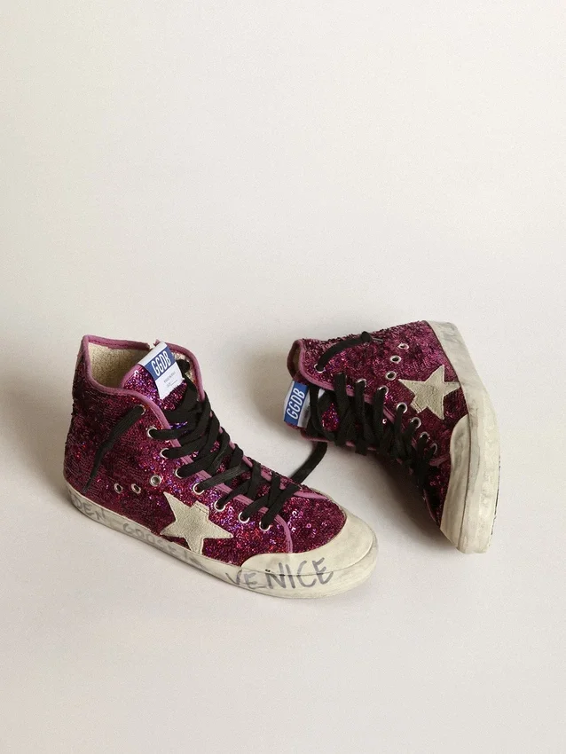 Francy Sneakers ornées de paillettes et d’un lettrage manuscrit sur la semelle extérieure