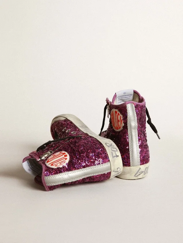 Francy Sneakers ornées de paillettes et d’un lettrage manuscrit sur la semelle extérieure