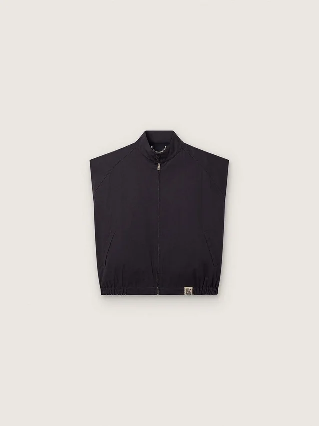 Gilet pour homme en sergé de coton bleu foncé avec fermeture à glissière et étiquette imprimée d’un drapeau