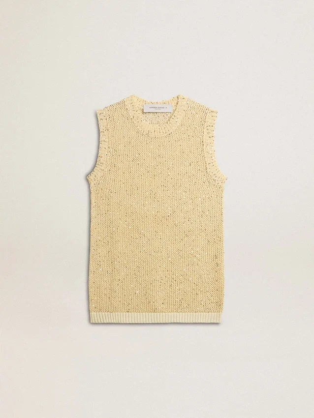 Haut en maille ajourée avec paillettes et détails contrastés