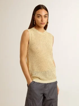 Haut en maille ajourée avec paillettes et détails contrastés