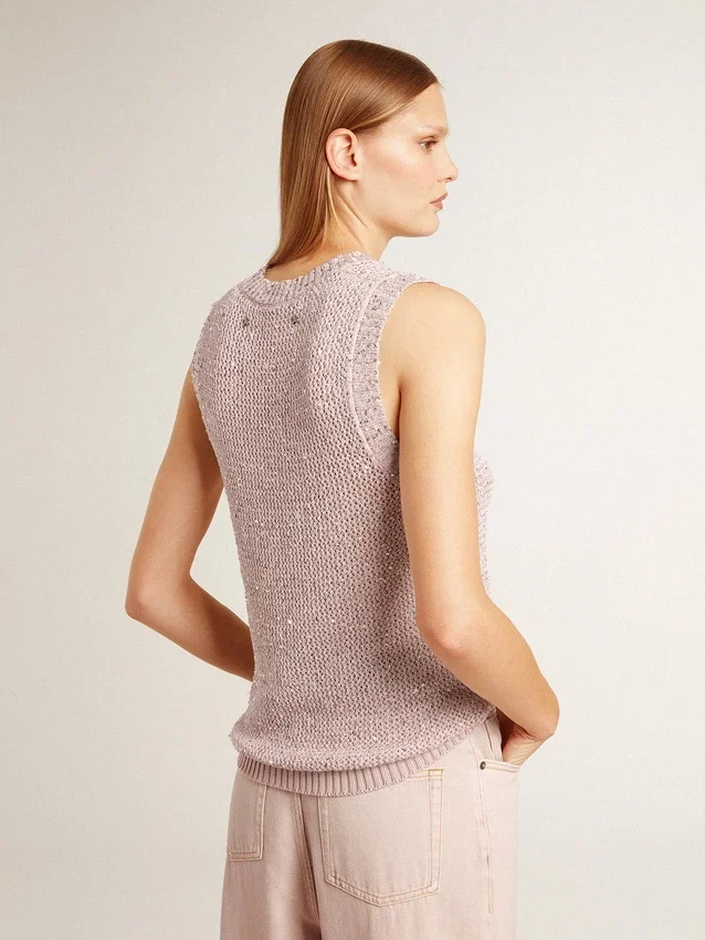 Haut en maille ajourée avec paillettes et détails contrastés