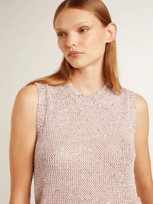 Haut en maille ajourée avec paillettes et détails contrastés