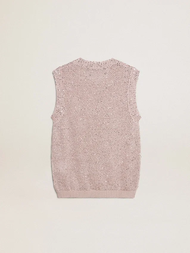 Haut en maille ajourée avec paillettes et détails contrastés
