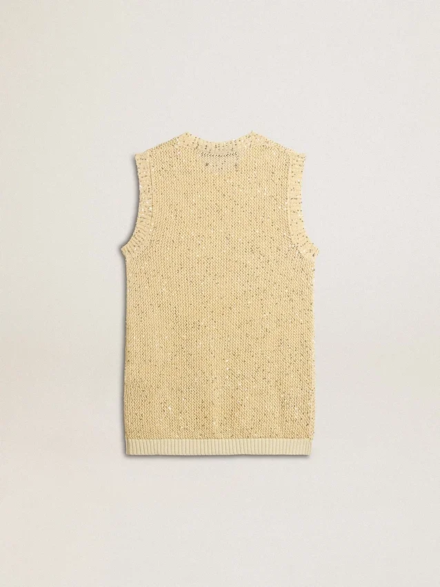 Haut en maille ajourée avec paillettes et détails contrastés