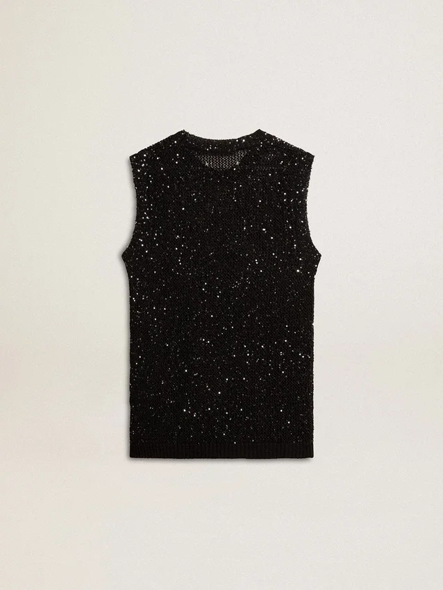 Haut en maille noire avec paillettes et détails contrastés