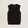 Haut en maille noire avec paillettes et détails contrastés