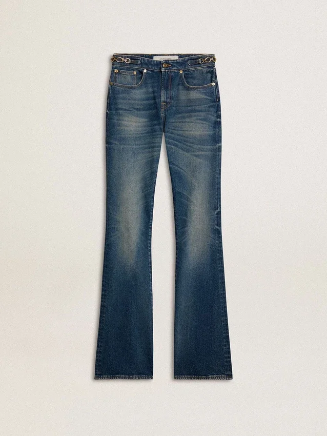 Jean bootcut pour femme au délavage vintage et aux détails métalliques