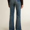 Jean bootcut pour femme au délavage vintage et aux détails métalliques