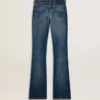 Jean bootcut pour femme au délavage vintage et aux détails métalliques