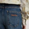 Jean bootcut pour filles, délavage moyen et broderies