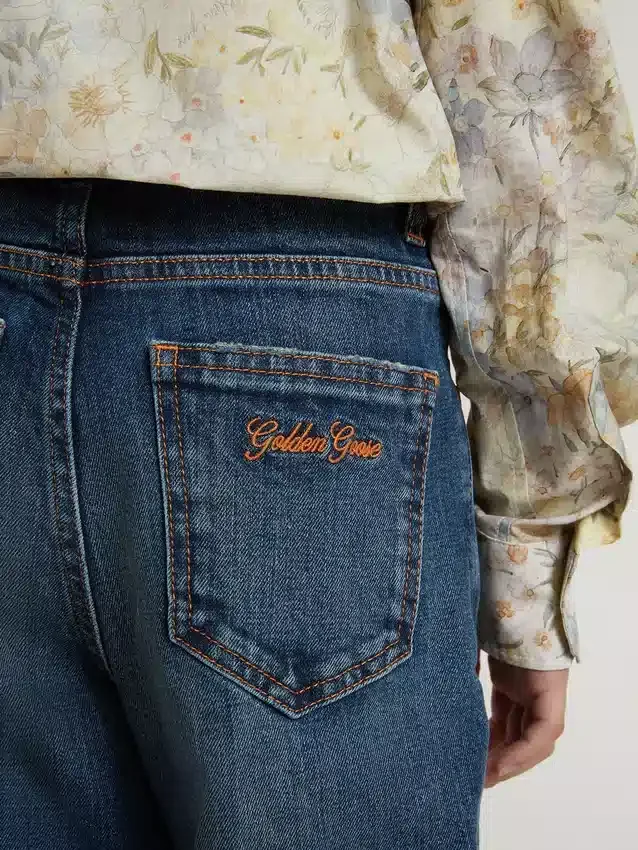 Jean bootcut pour filles, délavage moyen et broderies