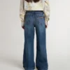 Jean bootcut pour filles, délavage moyen et broderies