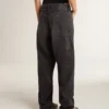 Jean noir en coton délavé pour femme avec empiècements sur le devant