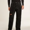 Jean noir pour homme à la coupe ample et à l’effet dégradé, entièrement orné de cristaux