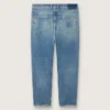 Jean slim pour homme au délavage moyen