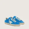 Jeune Super-Star en daim bleu vif avec une étoile en cuir blanc