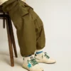 Junior Ball Star avec étoile turquoise et languette de talon en daim vert