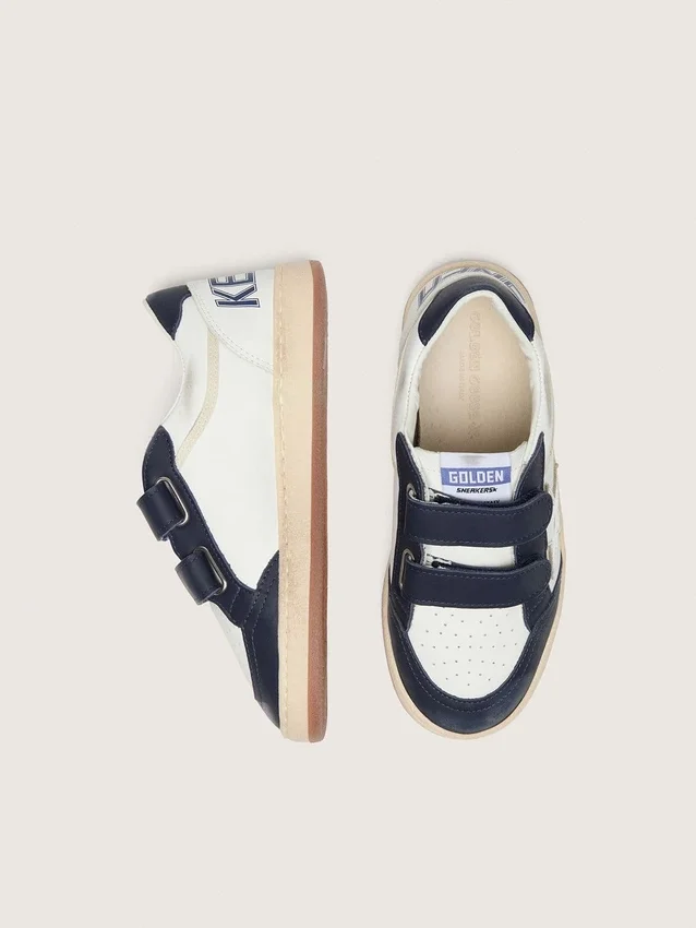 Junior Ball Star en cuir blanc avec une étoile en cuir argent métallisé et des empiècements en cuir bleu foncé