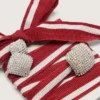 Lacets bicolores « Peaux » avec trois breloques argentées