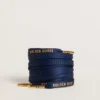Lacets en coton bleu avec logo doré contrastant