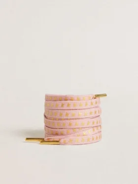 Lacets en coton rose avec des étoiles dorées contrastantes