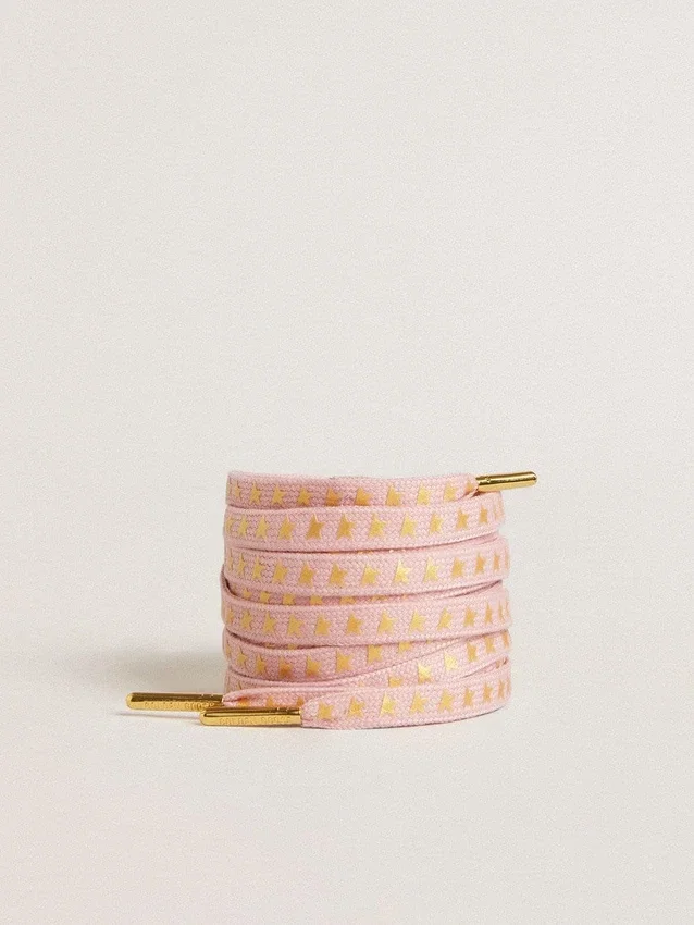 Lacets en coton rose avec des étoiles dorées contrastantes