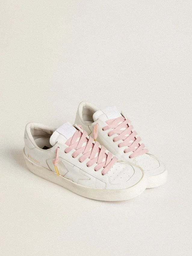 Lacets en coton rose avec logo doré contrastant