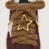 Lacets en laine de couleur marron « Peaux » avec mousqueton en forme d’étoile dorée