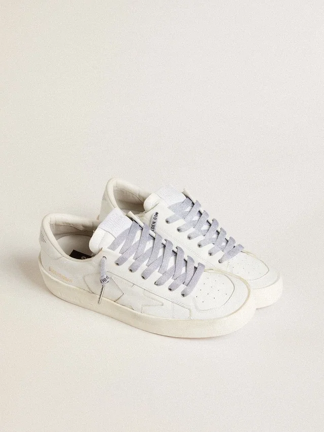 Lacets en lurex argenté avec logo noir contrastant